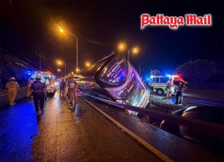 Tour bus crashes into car before plunging into roadside canal in Korat