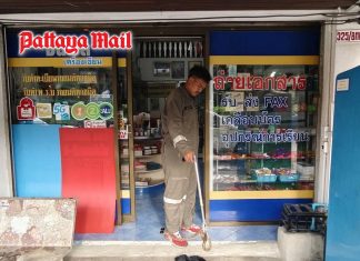 Unexpected visitor slithers into Pattaya stationery shop near school
