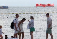 Tourists refuse to let Pattaya rain wash away their holiday
