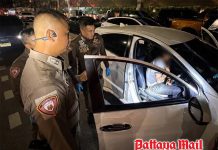 Bangkok Police stop drunk driver with loaded 9mm pistol within reach