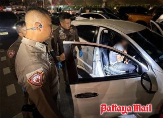 Bangkok Police stop drunk driver with loaded 9mm pistol within reach