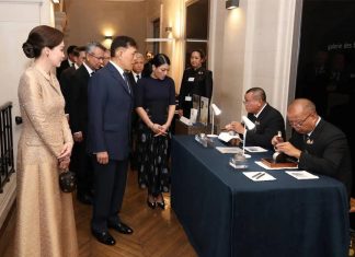 Thai King and Queen visit landmark Thai couture exhibition in Paris
