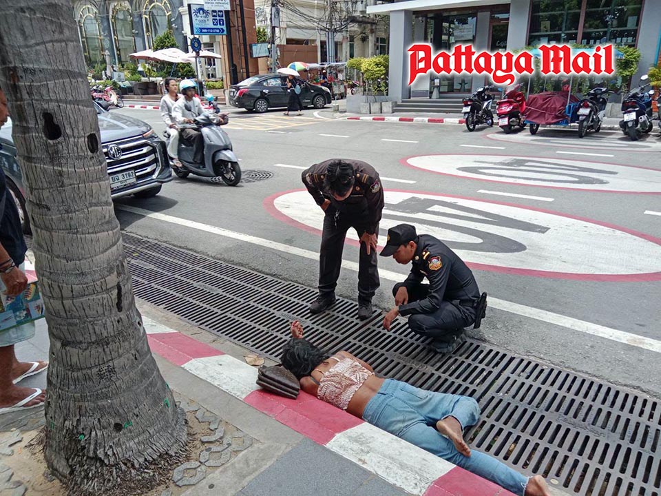 Face down beside busy road Pattaya officials rush to save woman