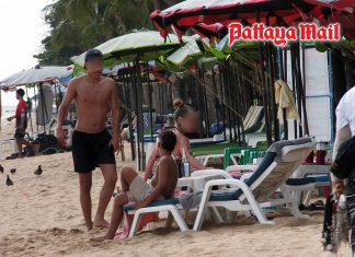 The rain will pass Pattaya visitors relax through tropical showers