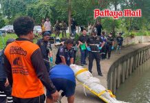 Mystery man found dead floating in Pattaya canal wearing guard shirt