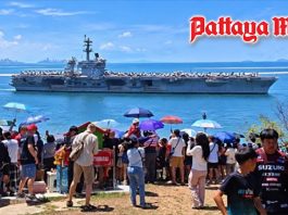 USS Abraham Lincoln departs Thailand as crowds gather to see carrier off