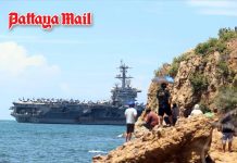 USS Abraham Lincoln departs Thailand as crowds gather to see carrier off