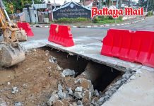 Road collapses into deep hole in central Chiang Rai