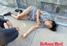 Jomtien officials rescue weak homeless man from footbridge