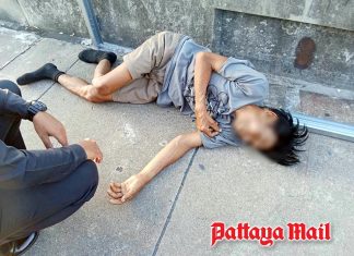 Jomtien officials rescue weak homeless man from footbridge
