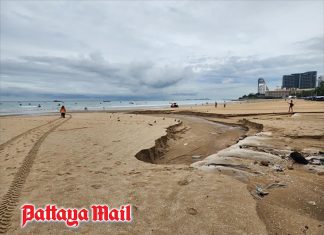 Pattaya crews race to restore beach after heavy rain