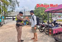Krabi Tourist Police help visitors arrange boat trips at Noppharat Thara Beach