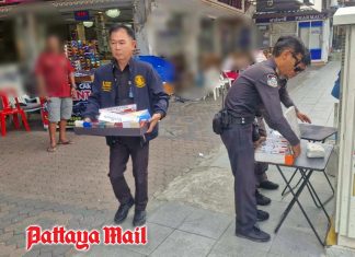 Pattaya officials seize tables and cigarettes from sidewalk vendors on Second Road