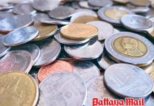 Thai baht nears 34 per dollar amid oil and bond market swings