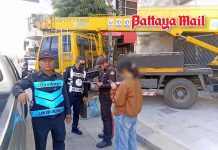Pattaya officials fine crane operator for placing stabilizers on pavement