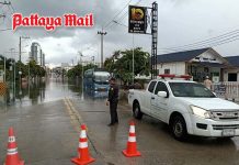 Sudden heavy rain floods Pattaya roads, shuts junction and disrupts traffic