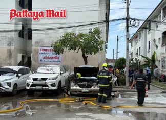Car catches fire at Pattaya government housing project