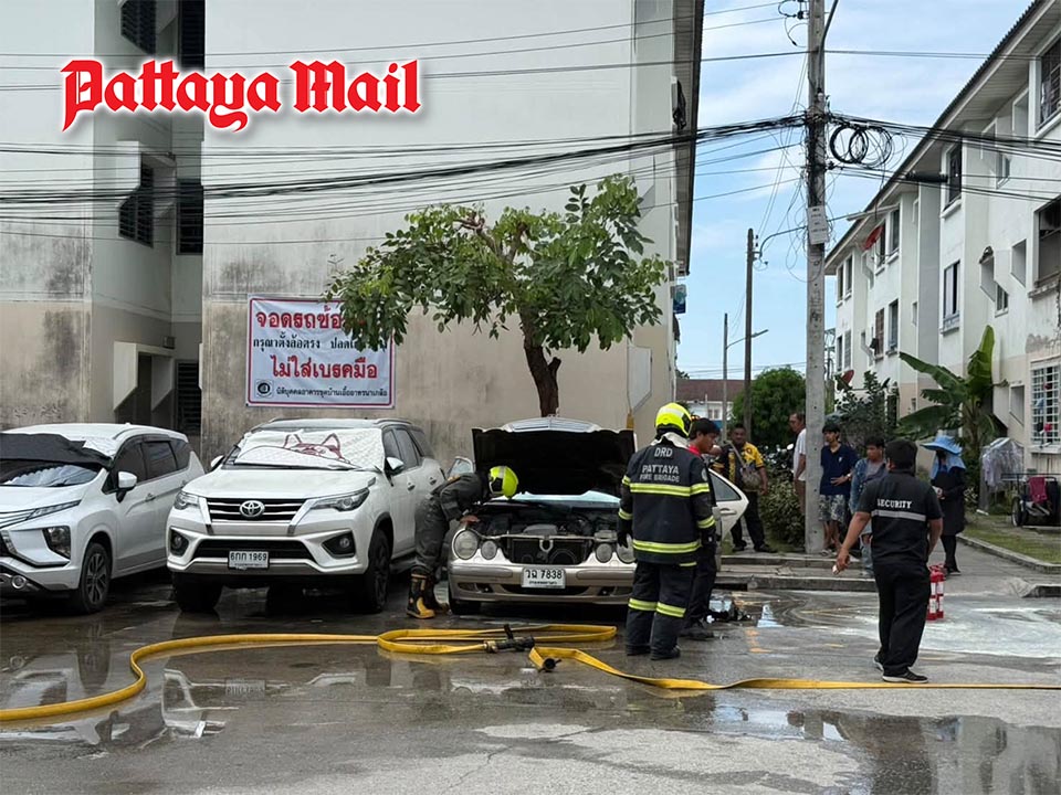 Car catches fire at Pattaya government housing project