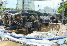 Powerful pumps drain floodwaters from Klong Chan housing estate in Bangkok