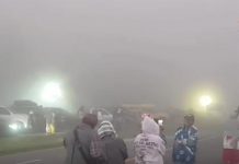 Tourists flock to Doi Inthanon despite thick fog and 20-metre visibility